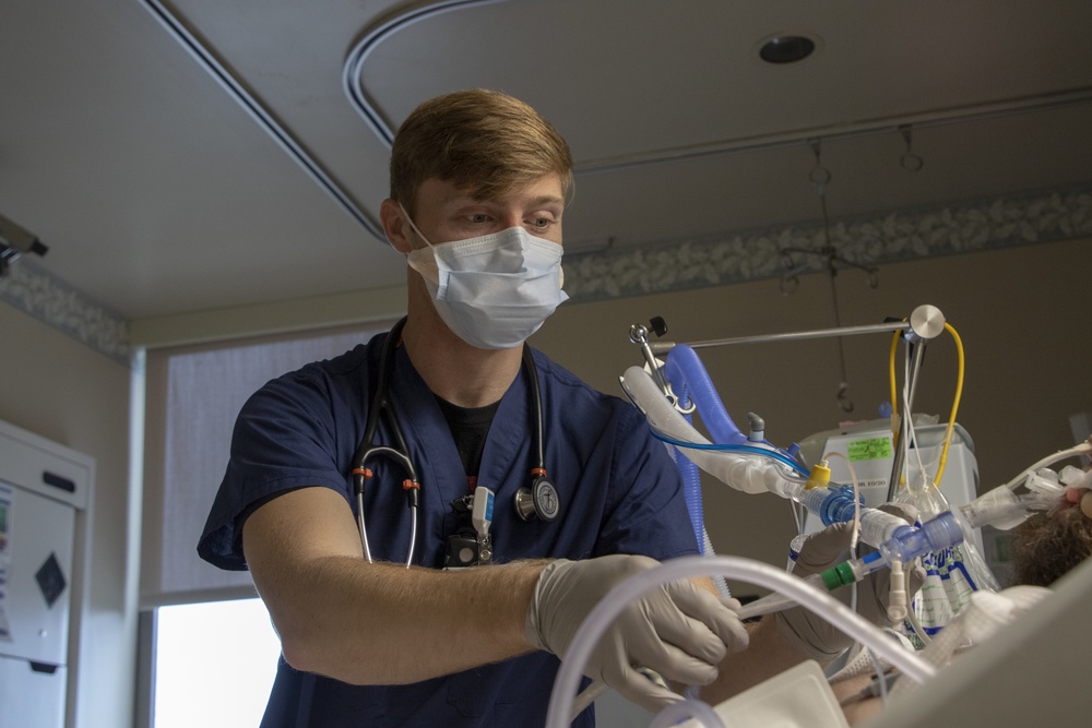 Senior Airman Nathan Nadeau works alongside Dameron Hospital personnel