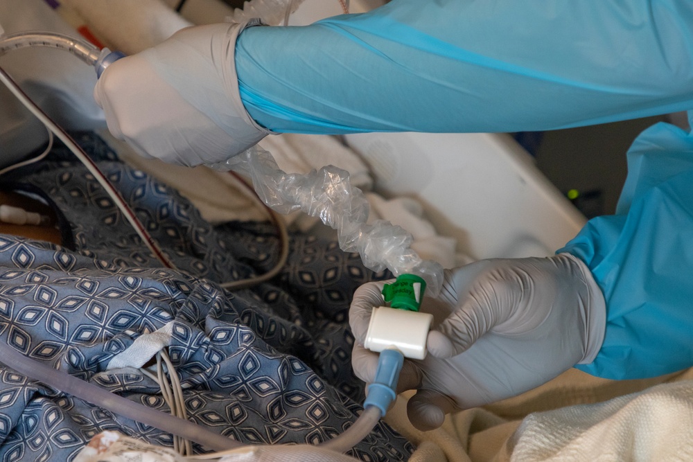 Senior Airman Nathan Nadeau works alongside Dameron Hospital personnel