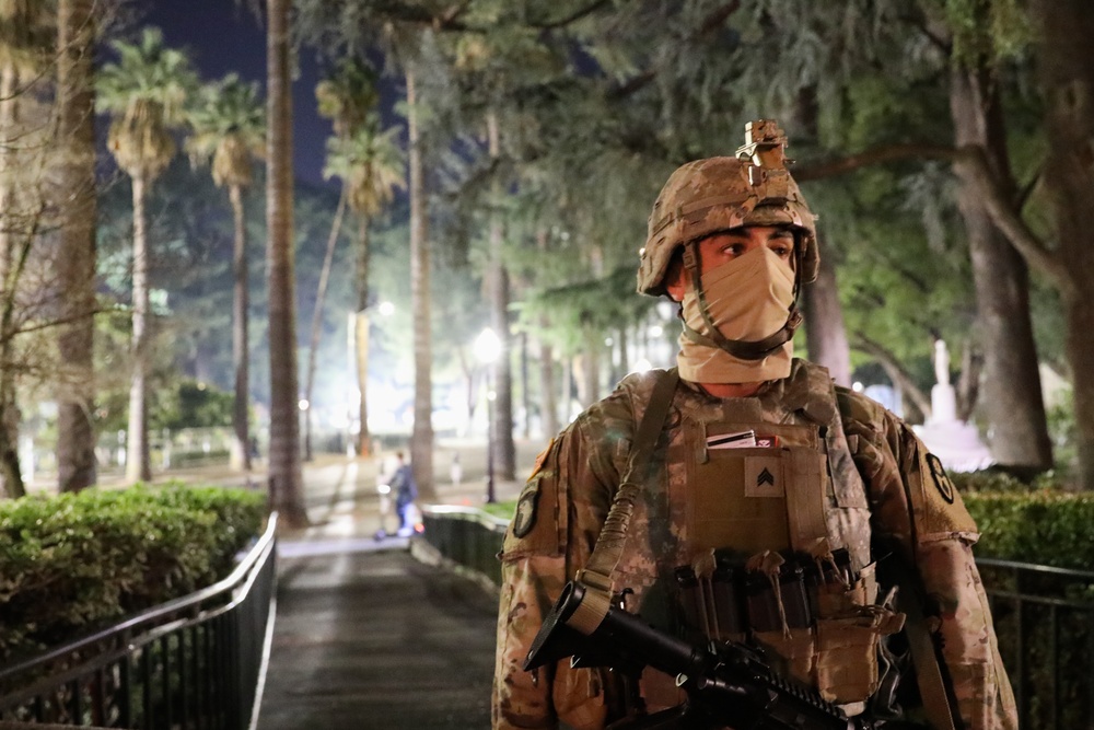 California National Guard conducts night patrol near Capitol building