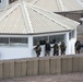 U.S. and French service members observe the Institut des hautes Études de Defense Nationale (IHEDN)