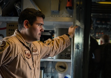 KC-10 provides fuel to E-3, F-15s