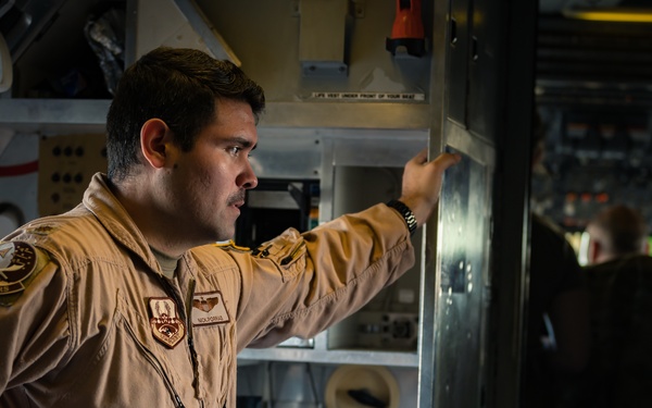 KC-10 provides fuel to E-3, F-15s