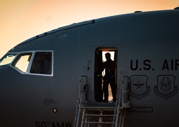 KC-10 provides fuel to E-3, F-15s