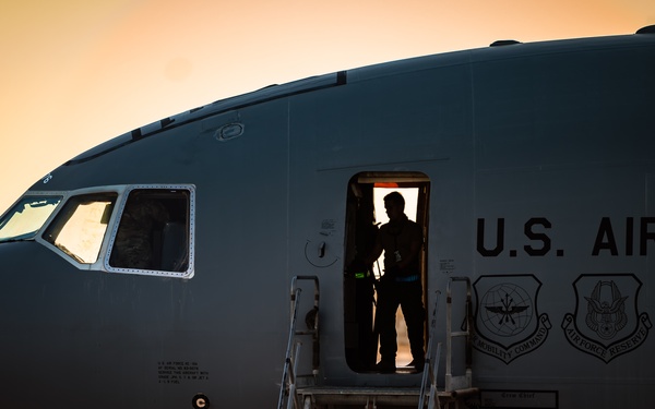 KC-10 provides fuel to E-3, F-15s