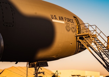 KC-10 provides fuel to E-3, F-15s