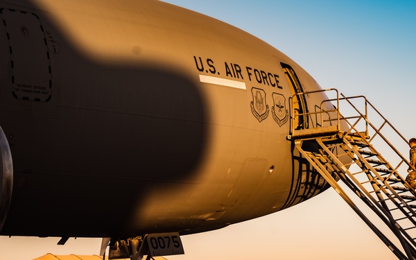 KC-10 provides fuel to E-3, F-15s