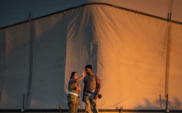 KC-10 provides fuel to E-3, F-15s