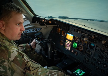 KC-10 provides fuel to E-3, F-15s