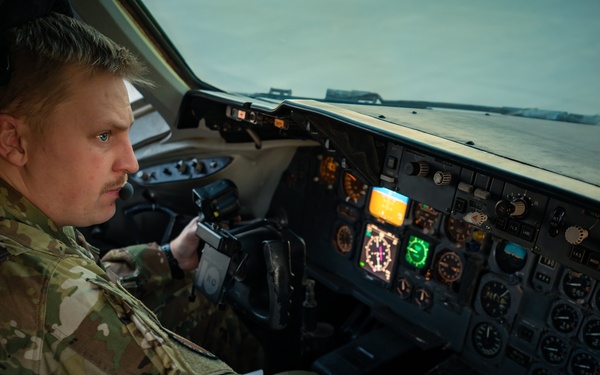 KC-10 provides fuel to E-3, F-15s