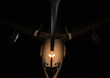 KC-10 provides fuel to E-3, F-15s