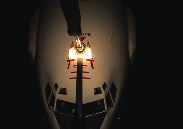 KC-10 provides fuel to E-3, F-15s