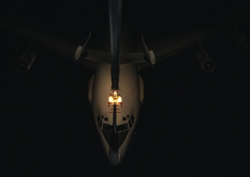 KC-10 provides fuel to E-3, F-15s