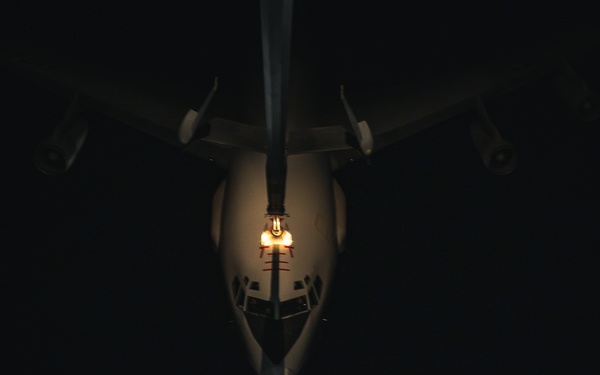 KC-10 provides fuel to E-3, F-15s