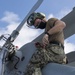 USS America (LHA 6) Sailor performs maintenance.