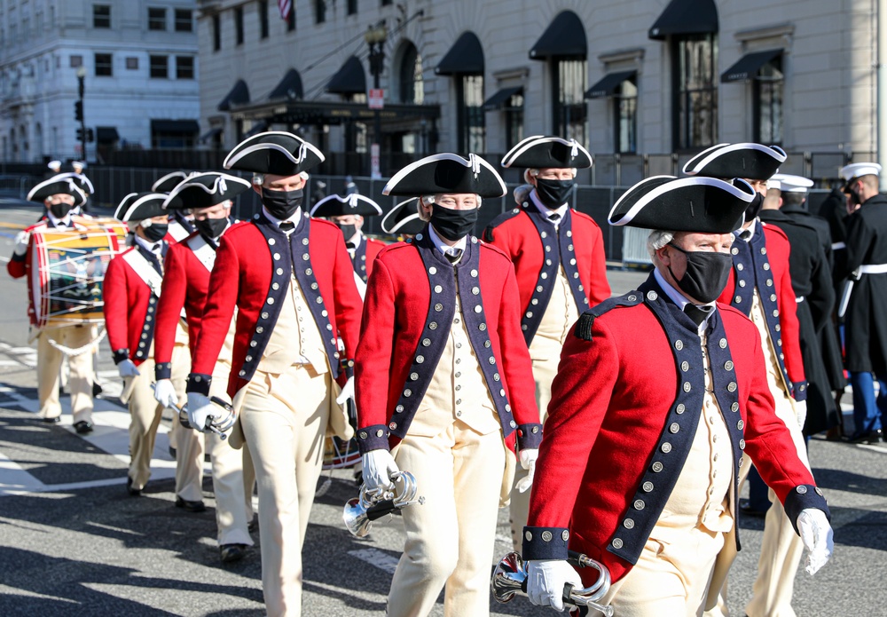 The U.S. Army Old Guard Fife and Drum Corps Soldiers march during rehearsal