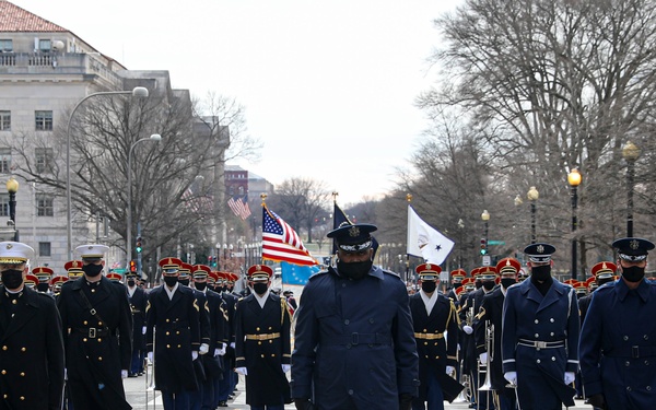 Members of the presidential escort prepare to march