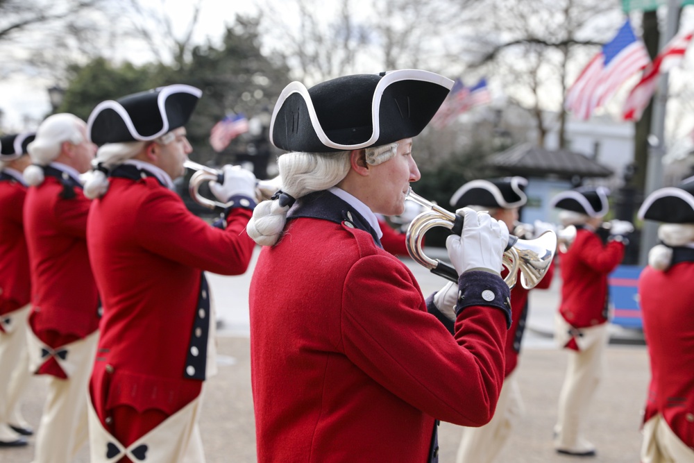 The U.S. Army Old Guard Fife and Drum Corps Soldiers march during rehearsal