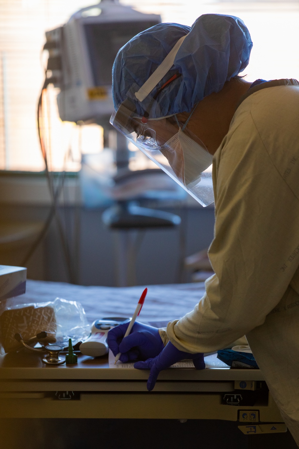 U.S. Navy Rapid Rural Response team works alongside Chinle Comprehensive Health Care Facility medical personnel