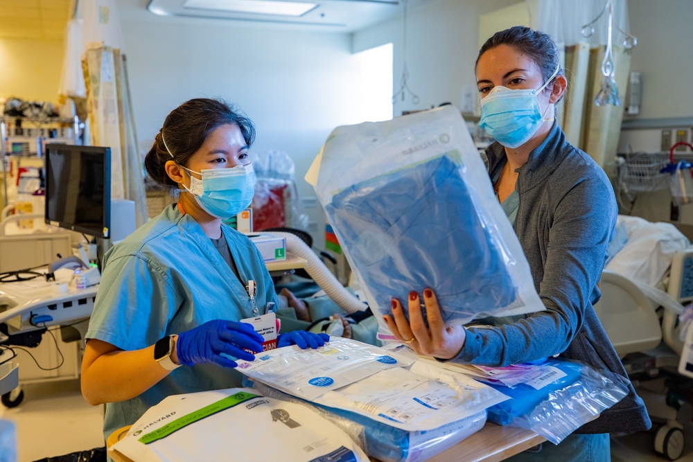 U.S. Air Force medical personnel work alongside Arrowhead Regional Medical Center providers