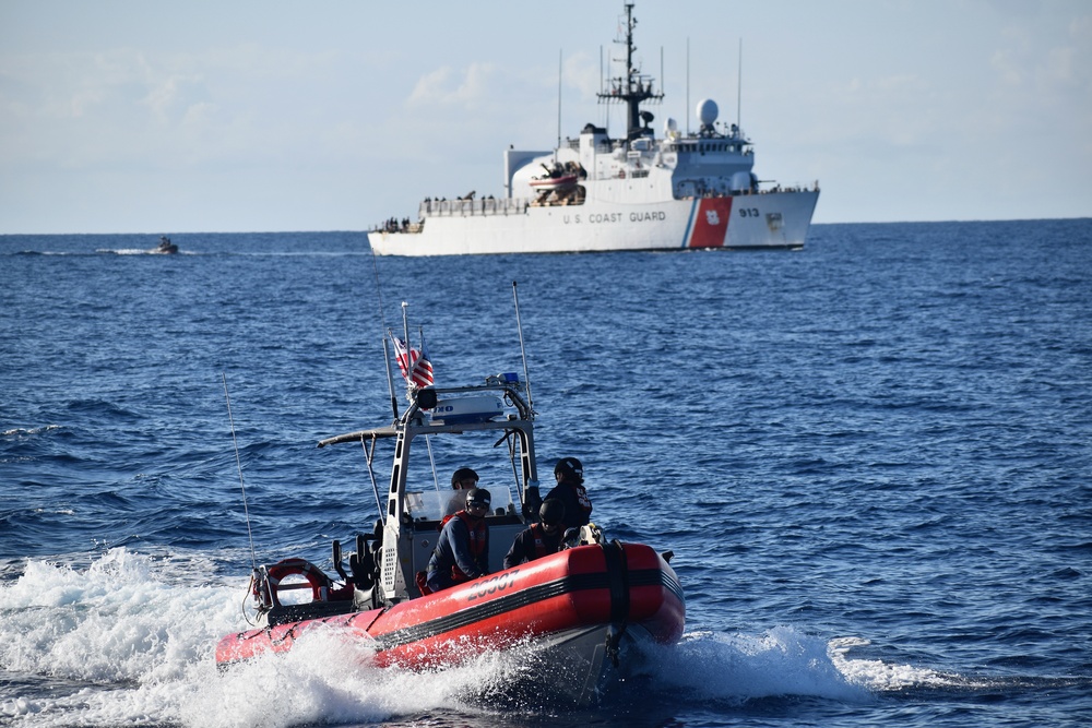 USCGC Resolute conducts at-sea transfer with USCGC Mohawk