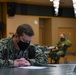 U.S. Navy Sailors Take E-7 Exam
