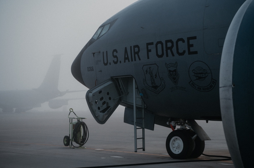 Fog rolls across the flighline at Al Udeid Air Base
