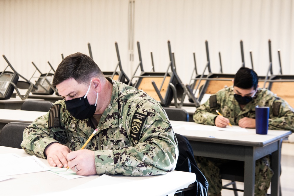 210119-N-TE695-0004 NEWPORT, R.I. (Jan. 19, 2021)  OTCN Sailors take E-7 advancement exam