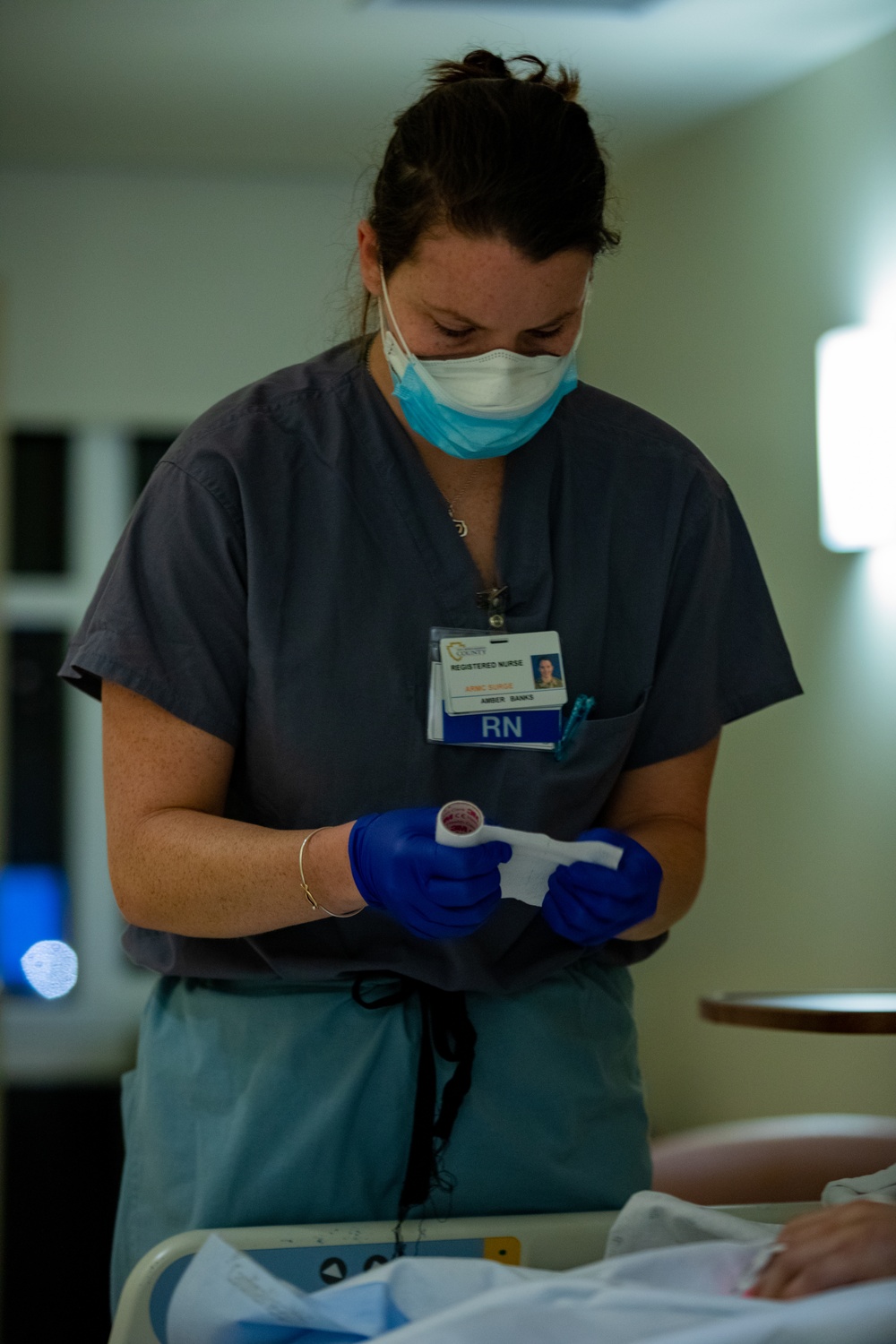 U.S. Air Force medical personnel work alongside Arrowhead Regional Medical Center providers