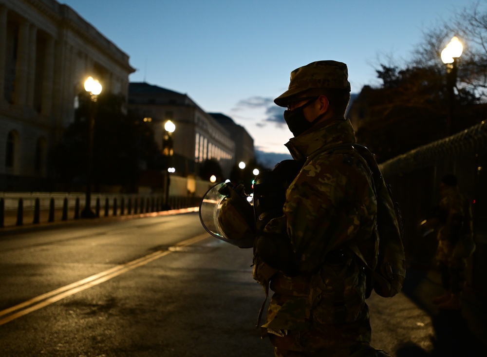 National Guard solider holds riot gear