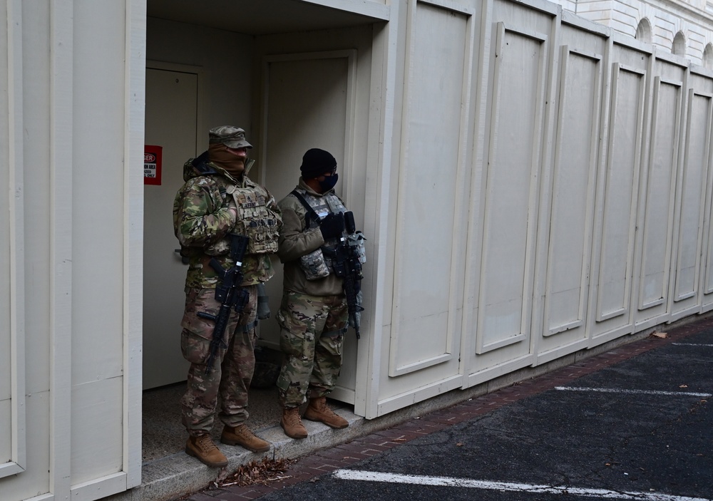 Maryland National Guard Soldiers stand guard