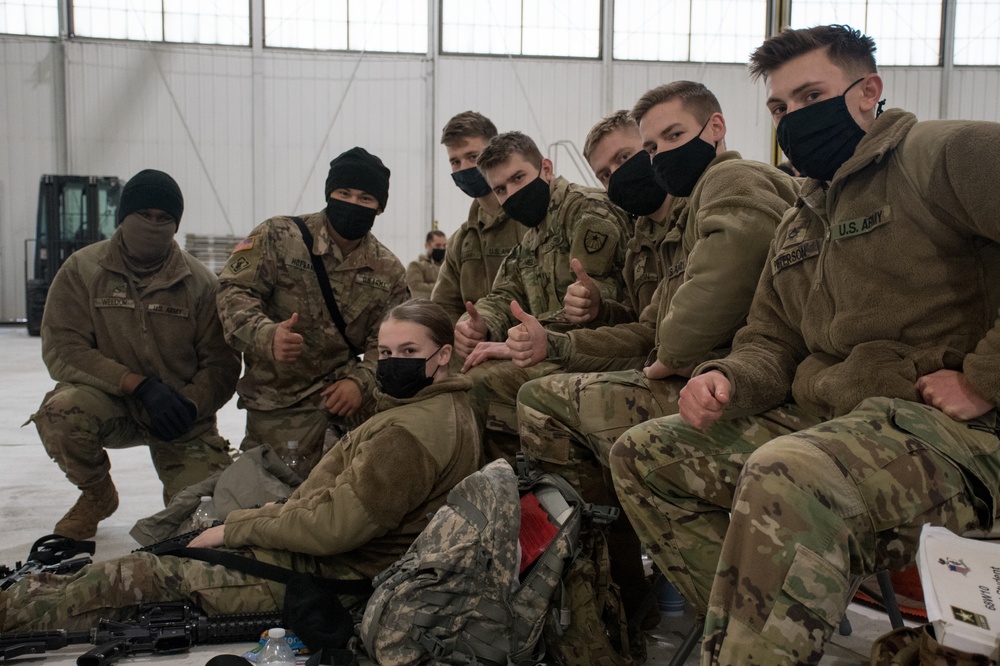 Soldiers from the 682nd Engineer Battalion wait for their flight to Washington D.C. from the 133rd Airlift Wing.