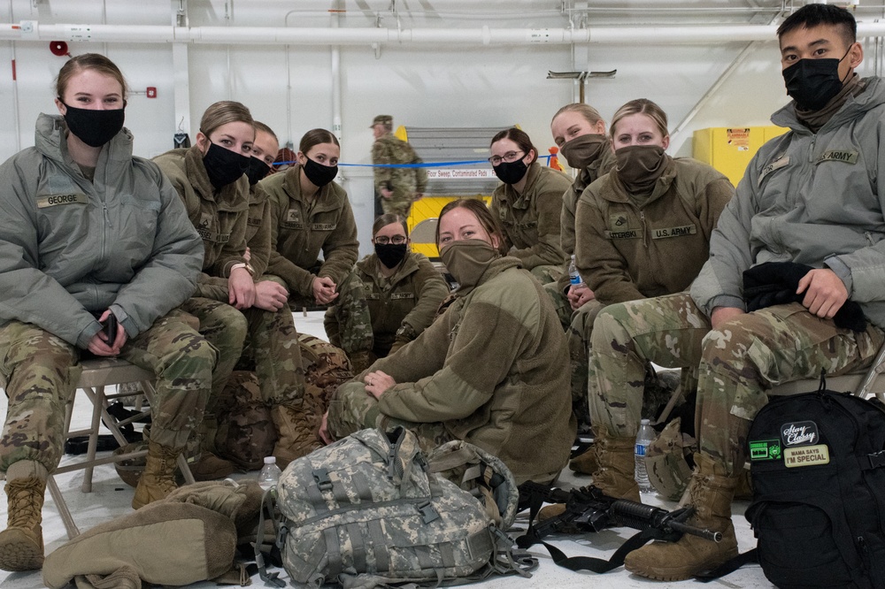 Soldiers from the 682nd Engineer Battalion wait for their flight to Washington D.C. from the 133rd Airlift Wing.
