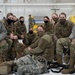 Soldiers from the 682nd Engineer Battalion wait for their flight to Washington D.C. from the 133rd Airlift Wing.