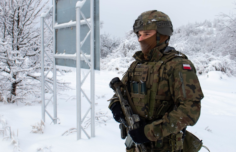 Polish KFOR Soldiers patrol the ABL