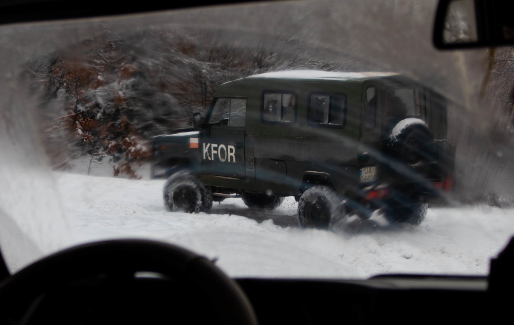 Polish KFOR Soldiers patrol the ABL