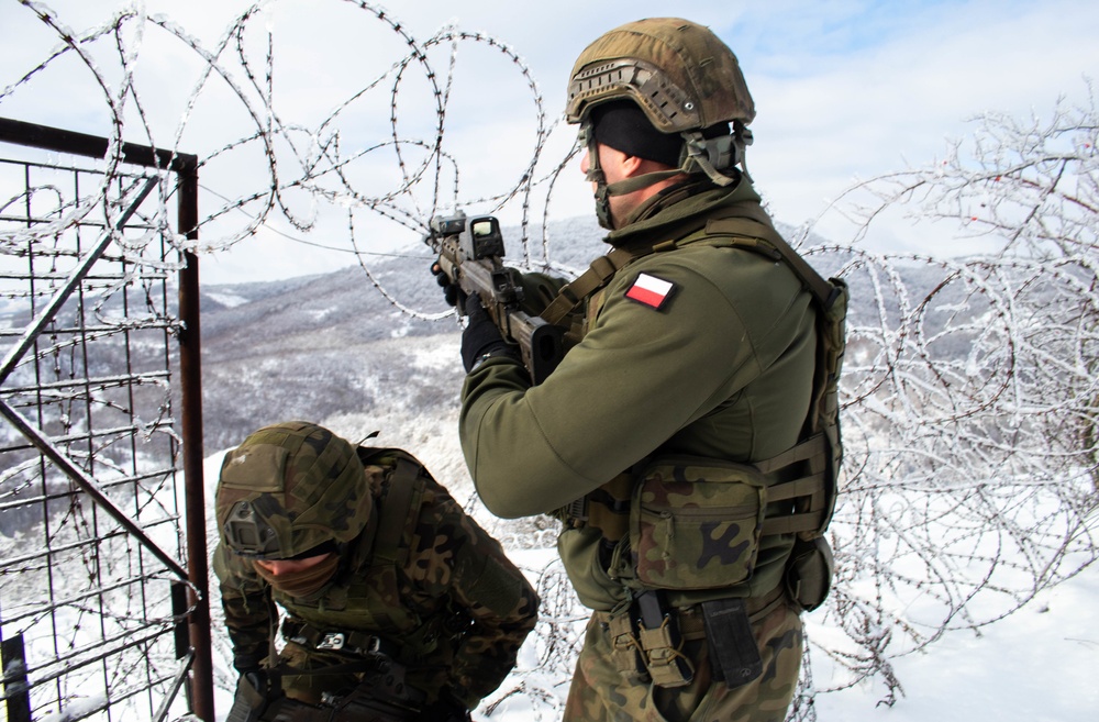 Polish KFOR Soldiers patrol the ABL