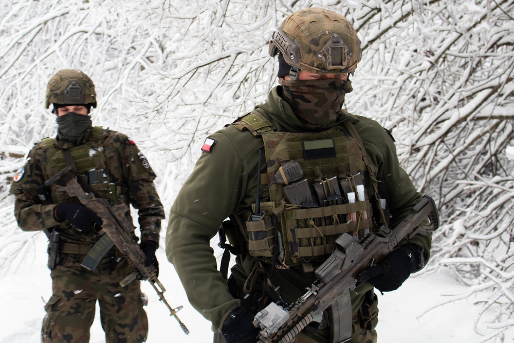 Polish KFOR Soldiers patrol the ABL