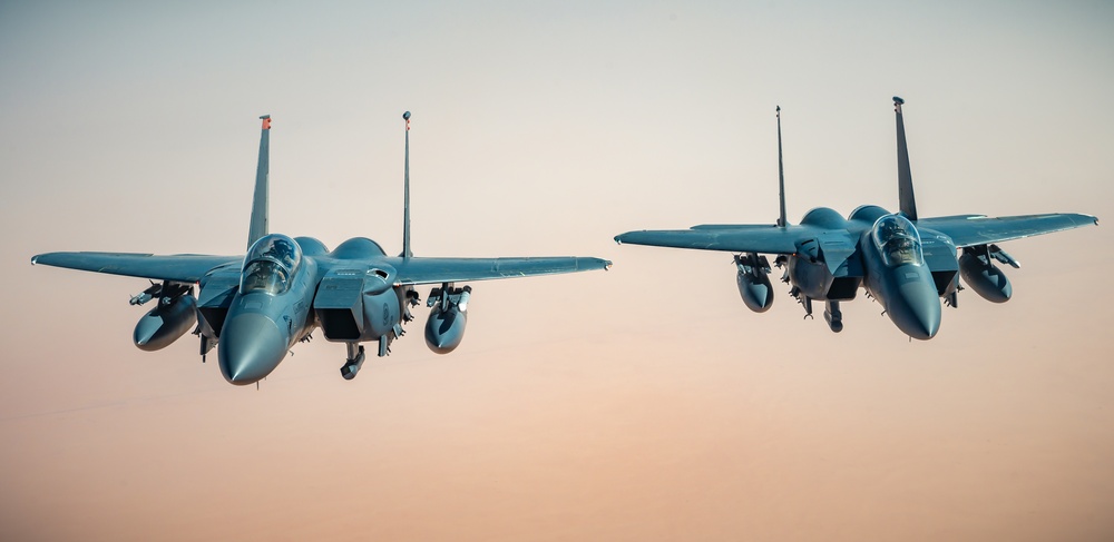 KC-135 provides fuel to F-15s
