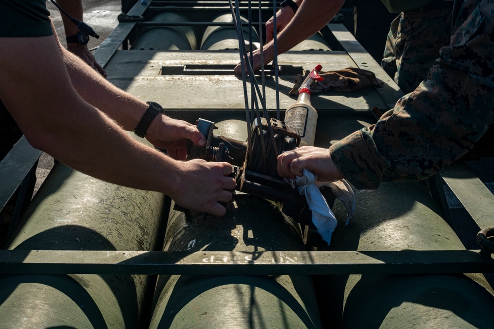 15th MEU Marines conduct preventive maintenance on HIMARS aboard Makin Island Amphibious Ready Group