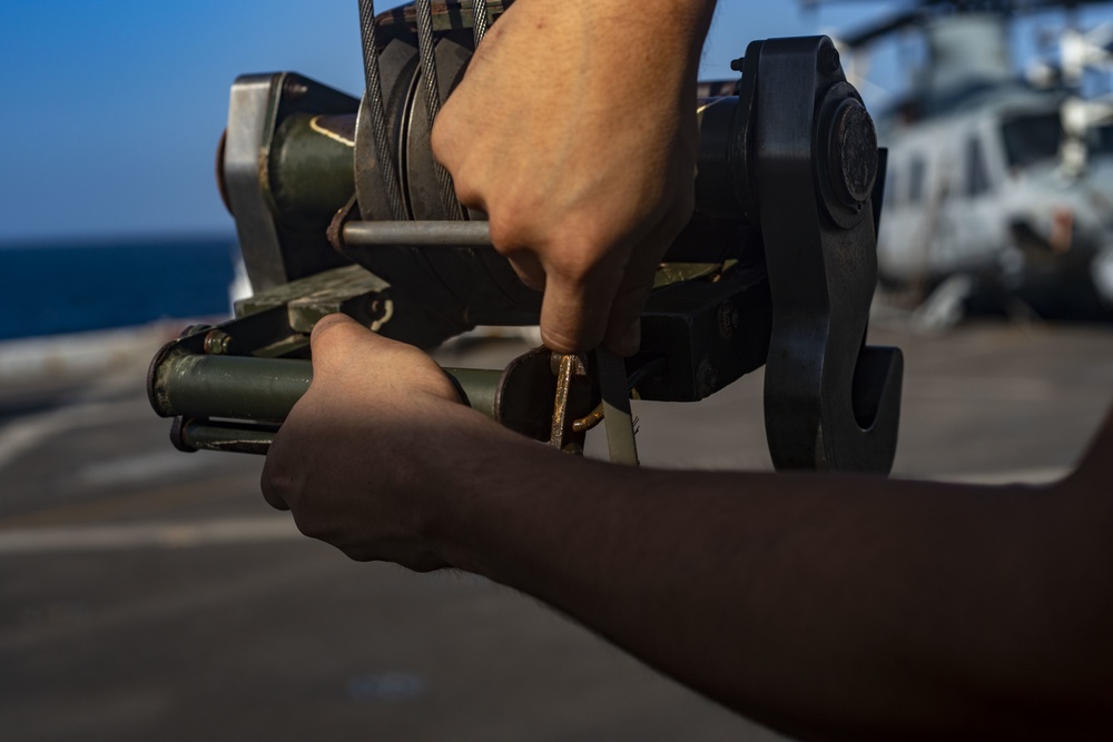 15th MEU Marines conduct preventive maintenance on HIMARS aboard Makin Island Amphibious Ready Group