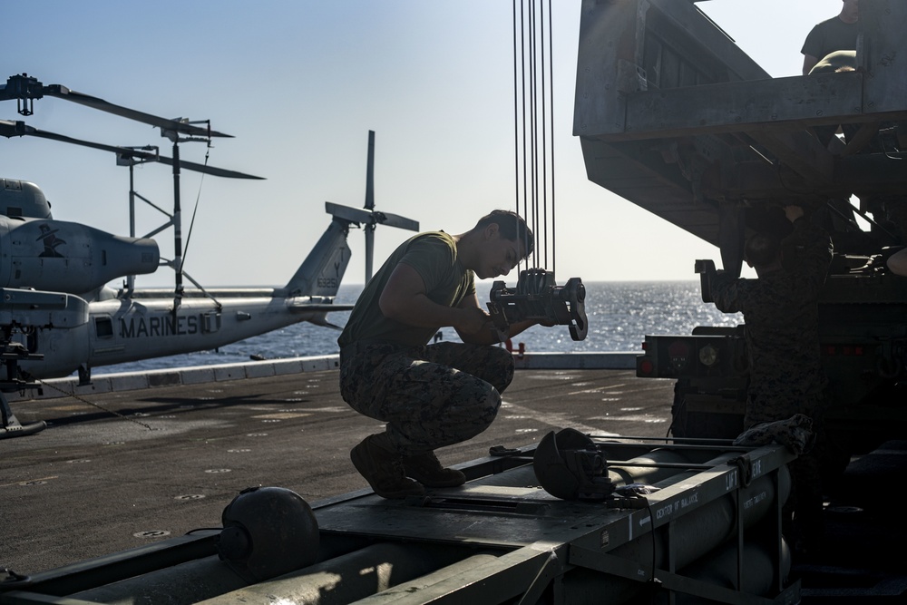 15th MEU Marines conduct preventive maintenance on HIMARS aboard Makin Island Amphibious Ready Group