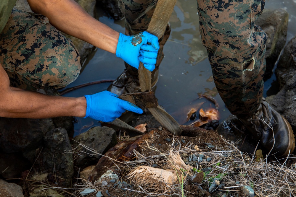 Taking out the trash: MCBH canal clean up