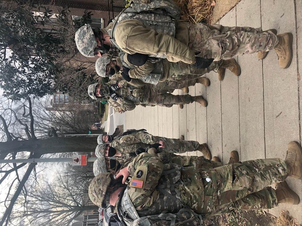 U.S. Soldiers from 851st Vertical Engineer Company prepare to move to their posts in Washington D.C.
