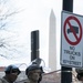 U.S. Soldiers from 851st Vertical Engineer Company stand in a staging area near the Washington Monument