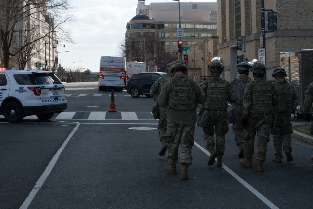 U.S. Soldiers from 851st Vertical Engineer Company walk a route in Washington D.C.