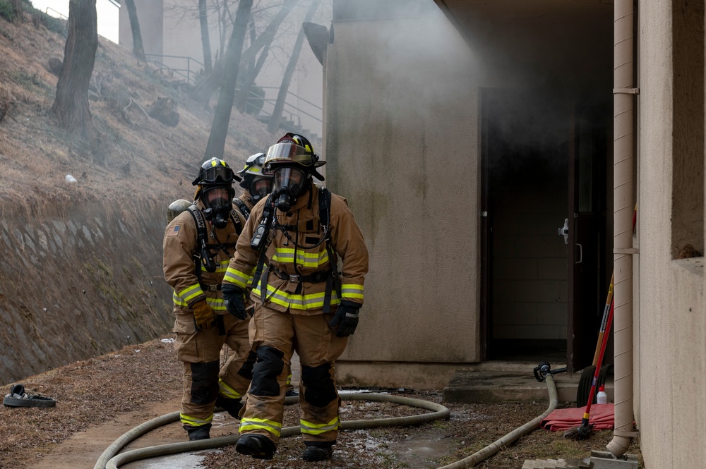 Osan FD practices fire training in real-world structure