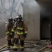 Osan FD practices fire training in real-world structure