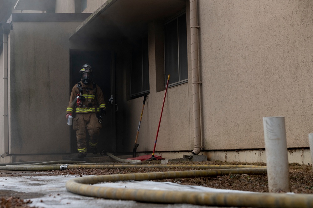 Osan FD practices fire training in real-world structure