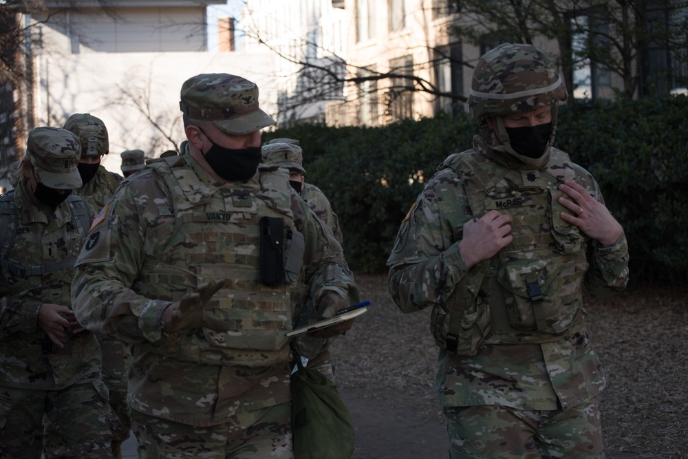 Commander of 682nd Engineer Battalion, MN National Guard, does a perimeter inspection with Commander of Team Crowd in Washington D.C.