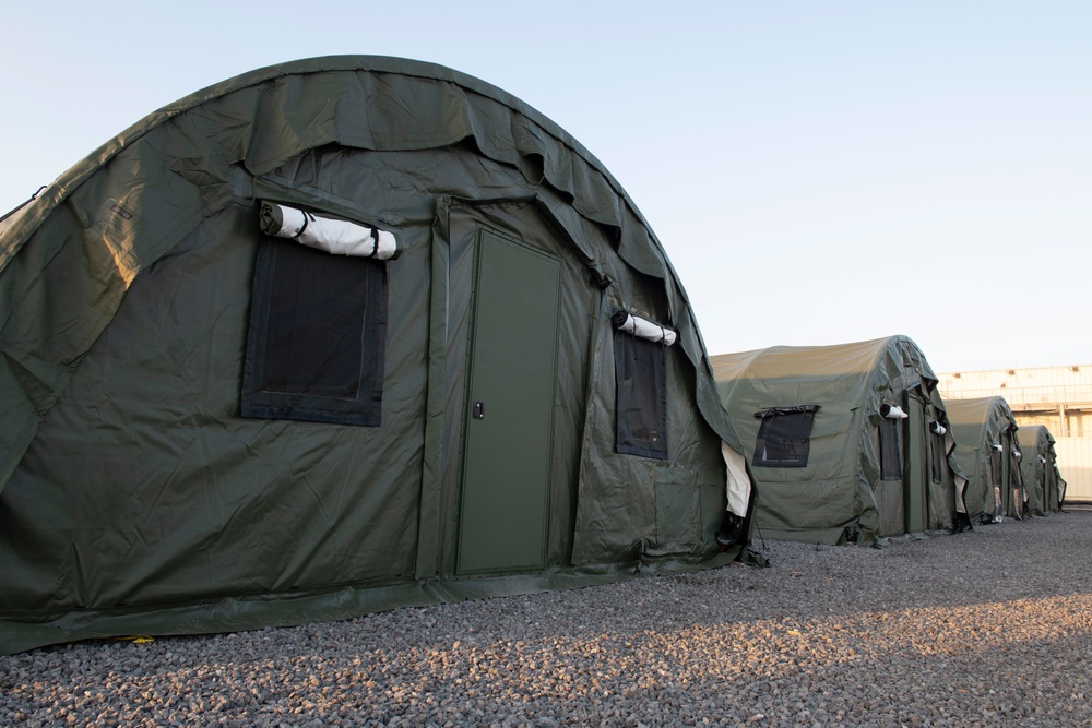 Soldiers Assemble Tents in Response to Troop Surge